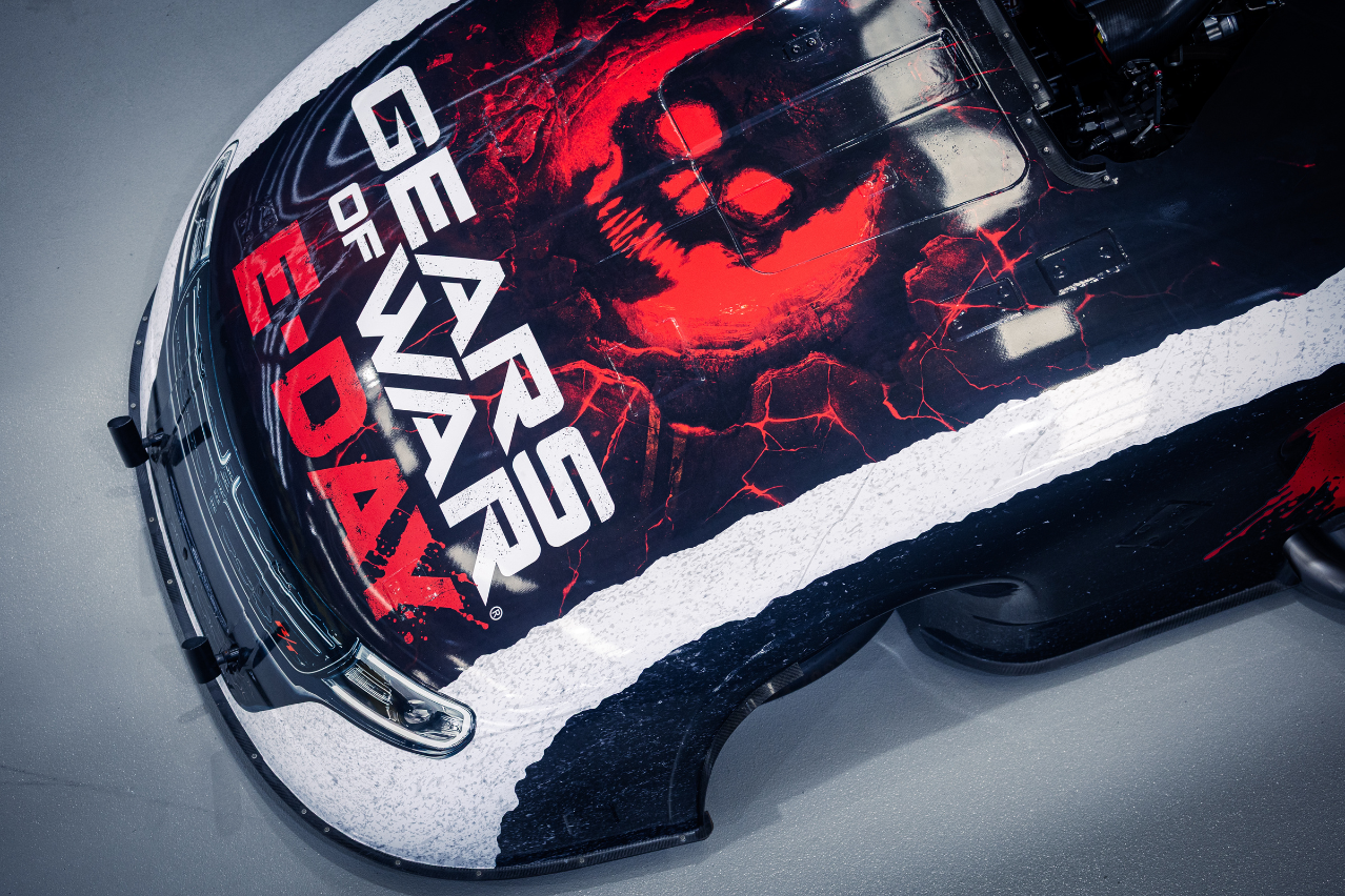 Close-up of the Gears of War: E-Day bonnet artwork on the Xbox Nitro Funny Car, featuring the red skull graphic.